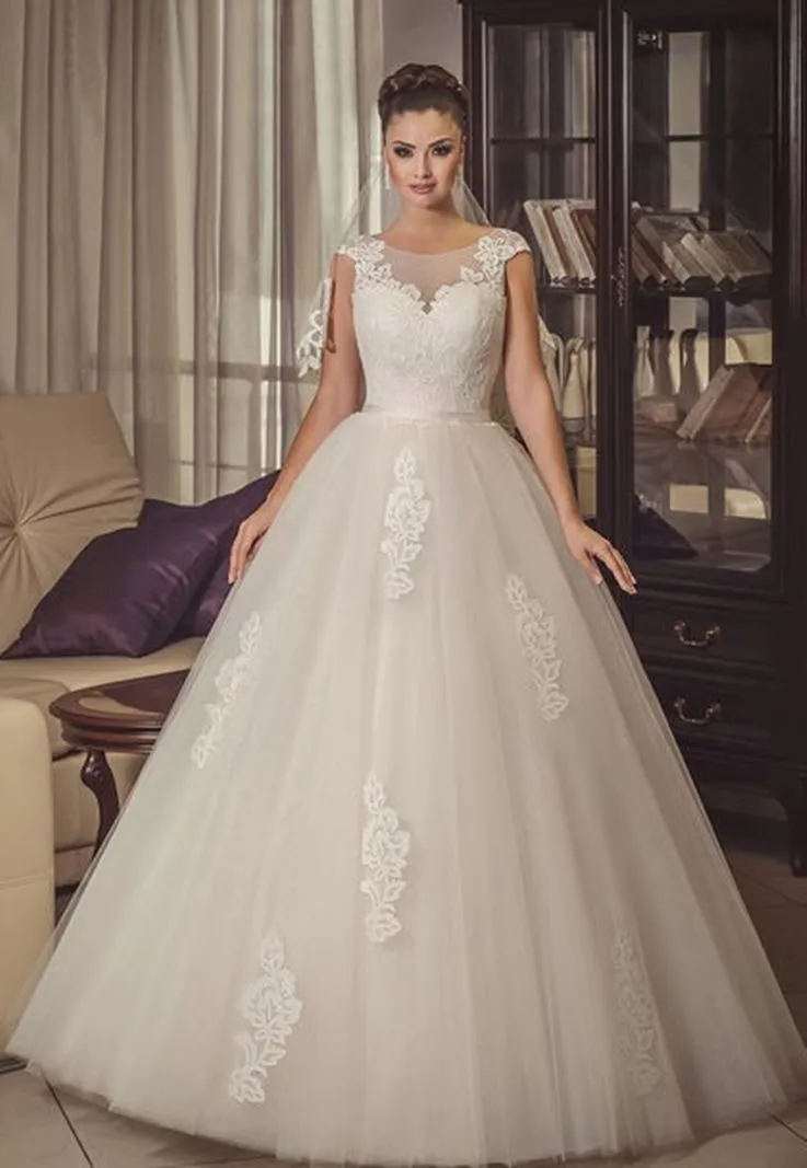 ---A line style wedding dress for women in flesh made of tulle with lace appliques, full skirt--
