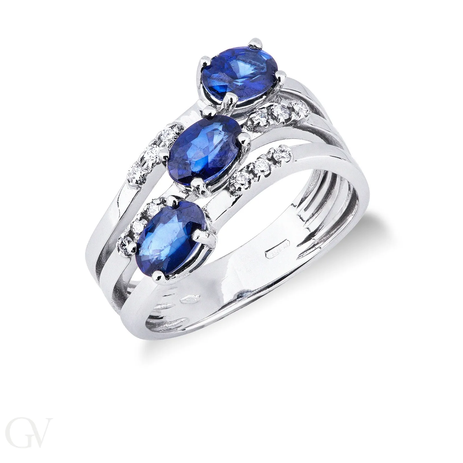 Anello in oro bianco 18k con diamanti e 3 zaffiri blu