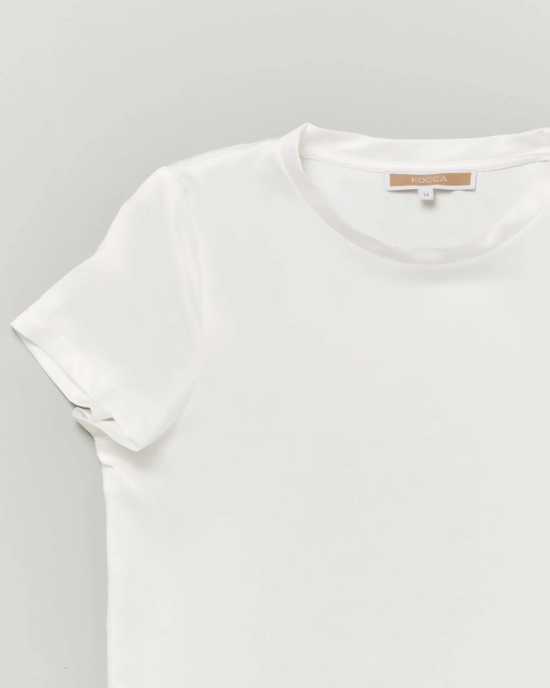 Blusa bianca in raso a maniche corte 10-16 anni
