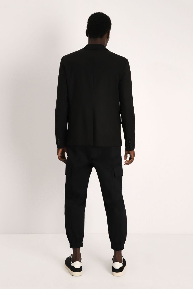 Giacca monocolour con rever classici e zip
