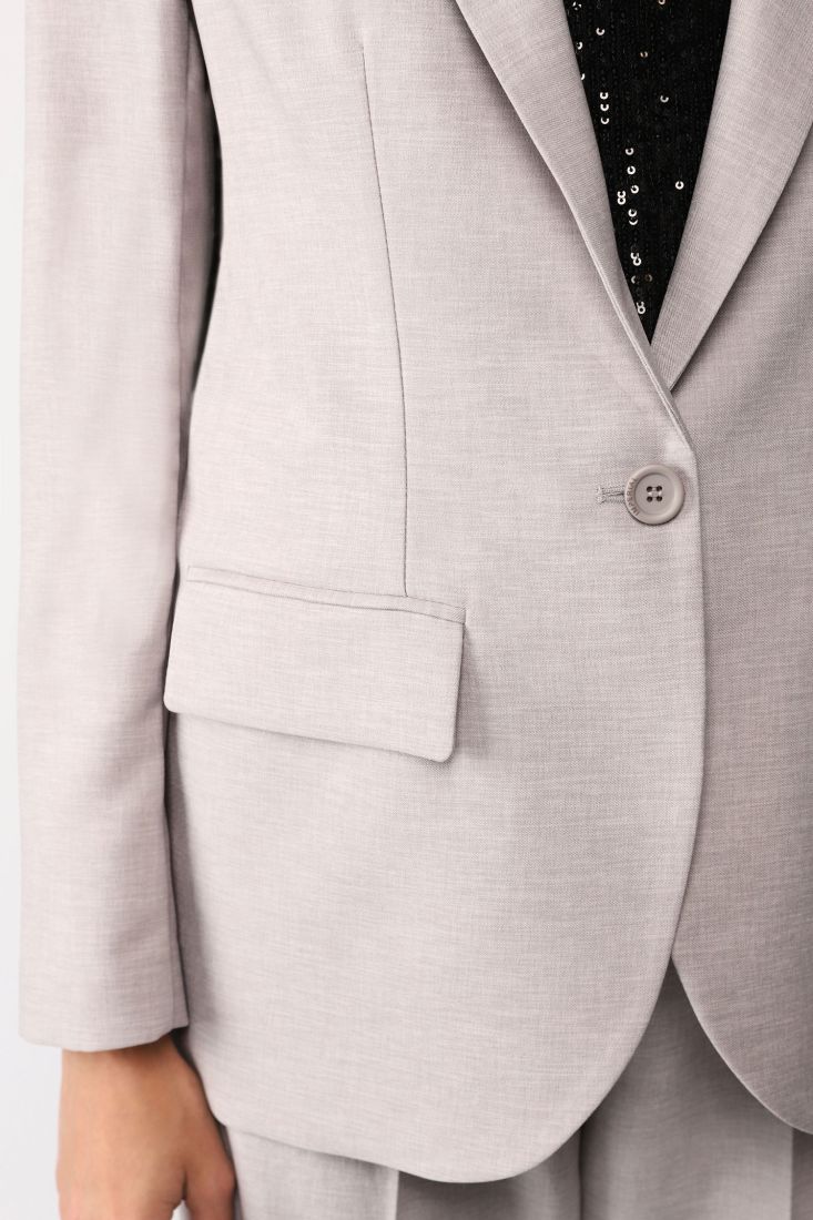 Giacca monopetto monocolour con revers classici