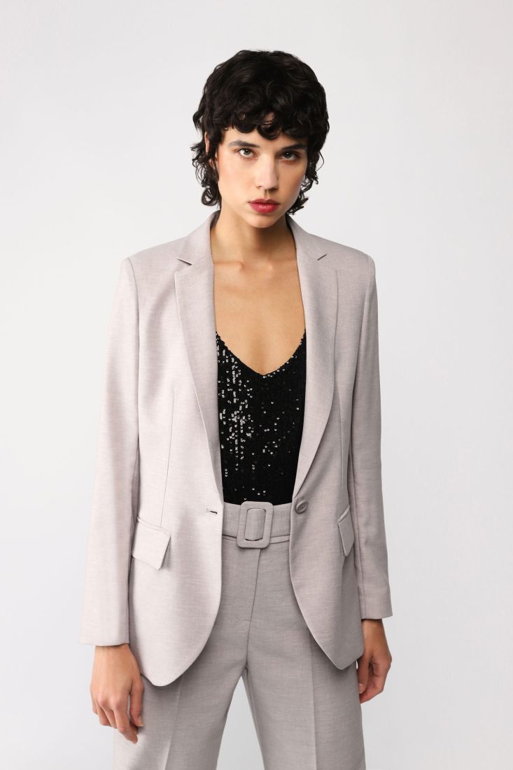 Giacca monopetto monocolour con revers classici