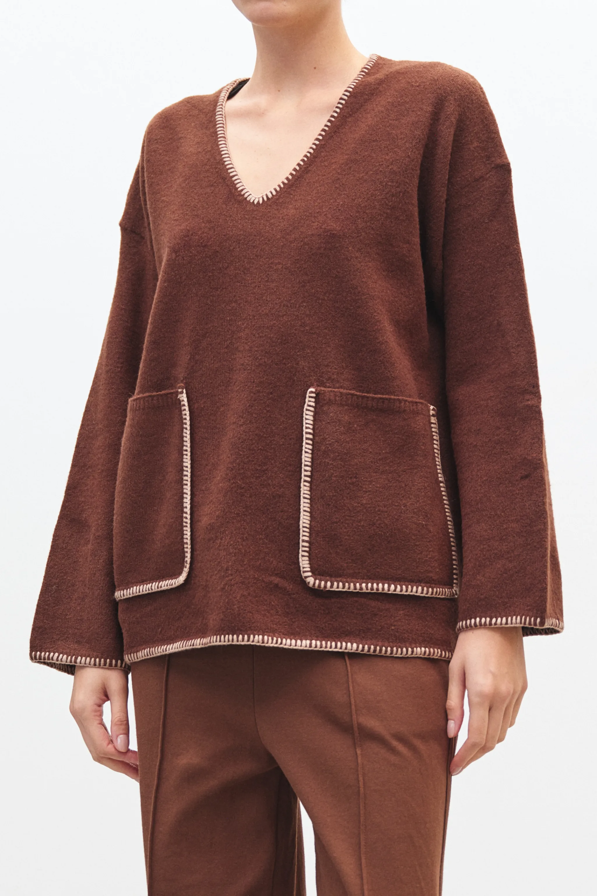MAGLIONE CON TASCHE
