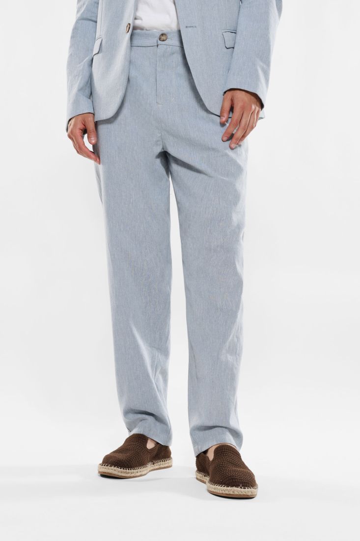 Pantaloni slim-fit con tasche verticali e pinces
