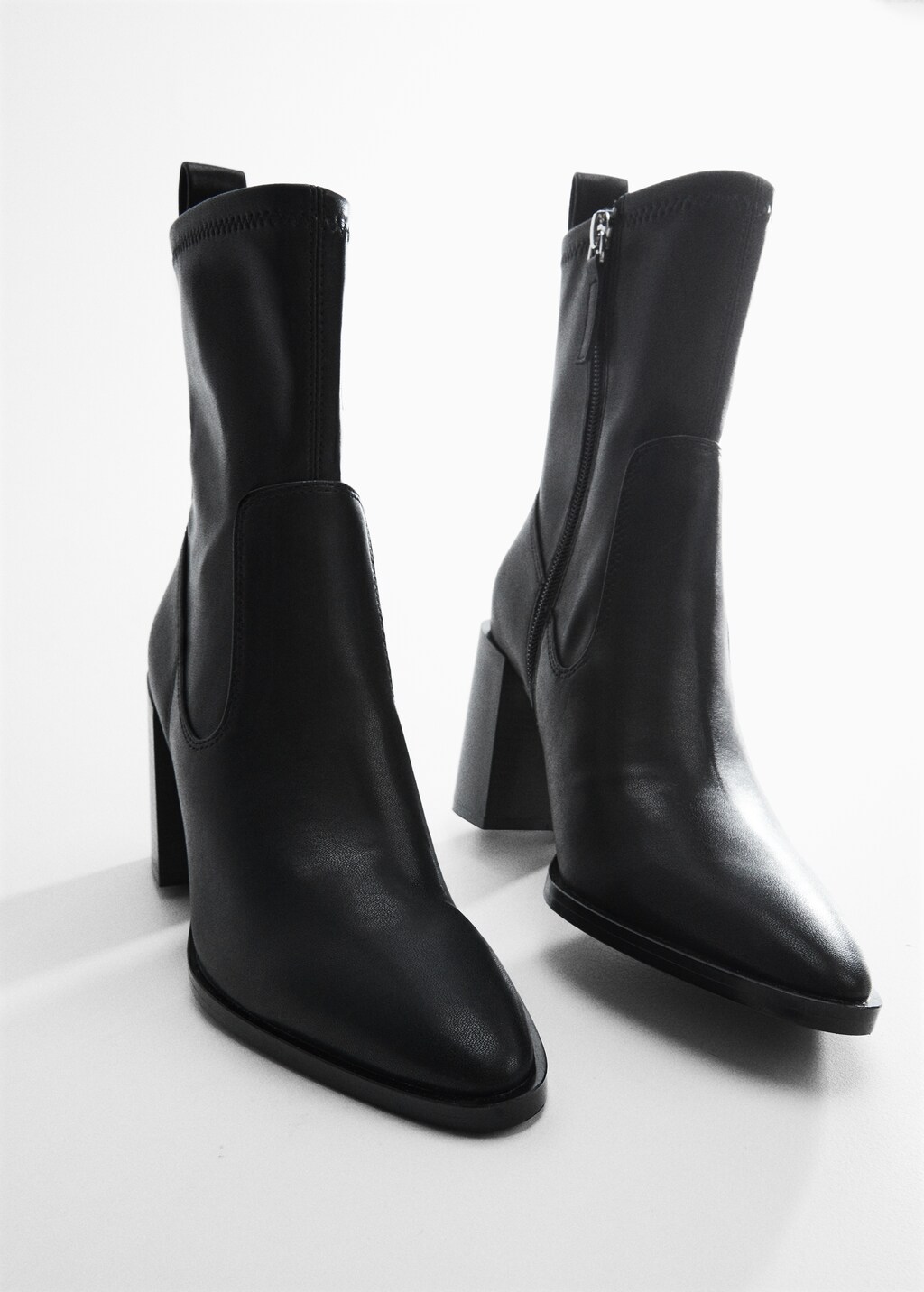 Stivaletti zip tacco